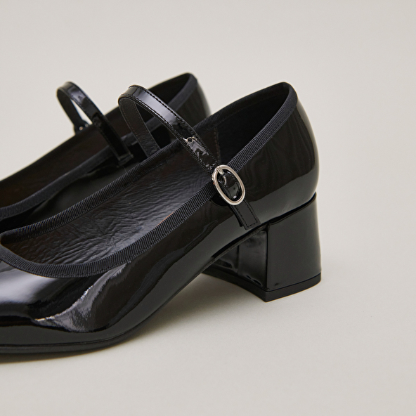 Heeled slippers in black patent leather | DALMATIE