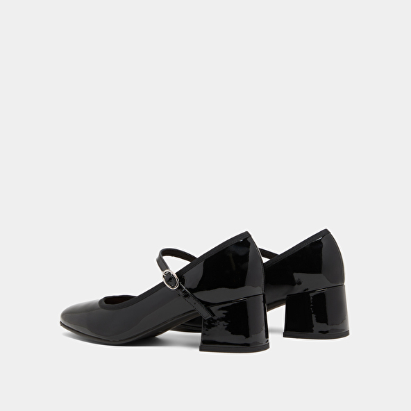 Heeled slippers in black patent leather | DALMATIE