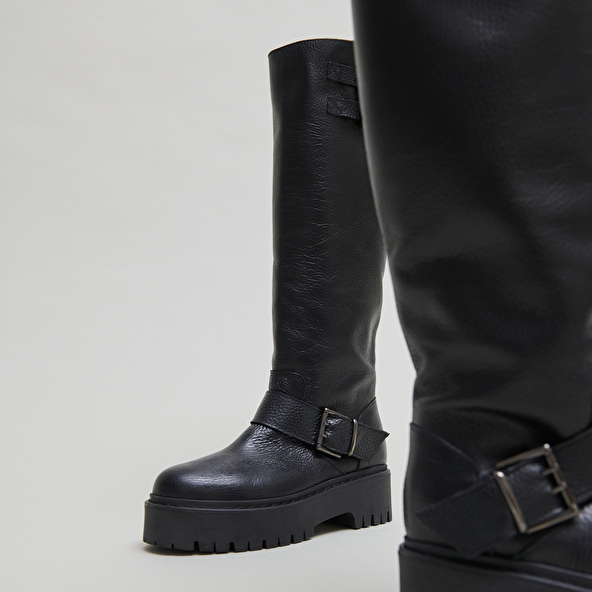 Chunky Strap Boots with Treaded Soles in black grained leather | REINE