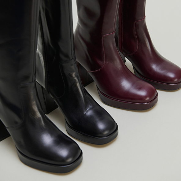 Platform boots in black leather | VENDOME