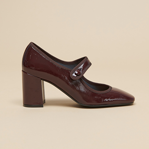 Heeled babies with big buckle straps in black pleated patent leather | DRANCY