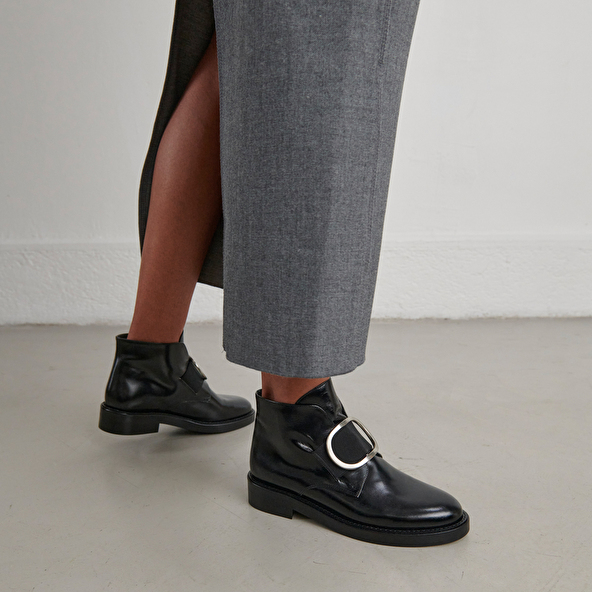 Boots with heels in black leather | DICTEE