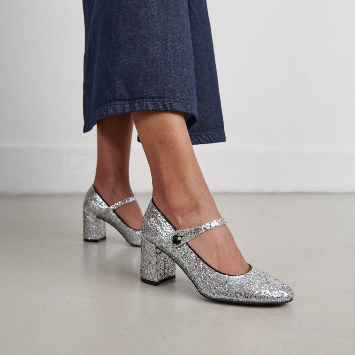 Heeled babies in silver and black glitter and patent | DAFT