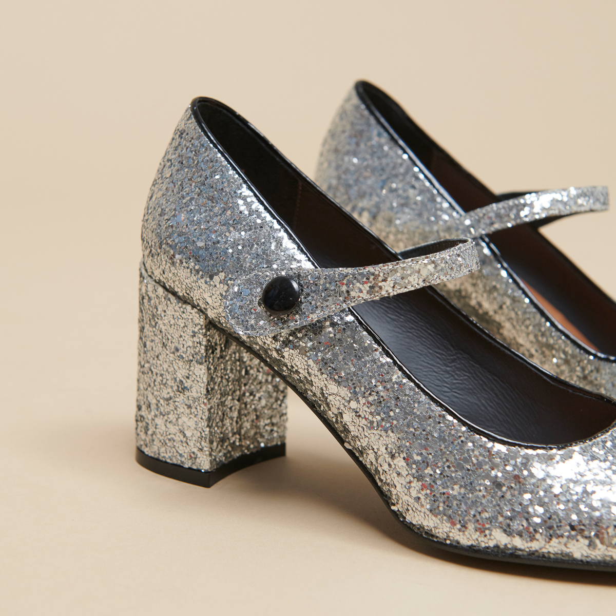 Heeled babies in silver and black glitter and patent | DAFT