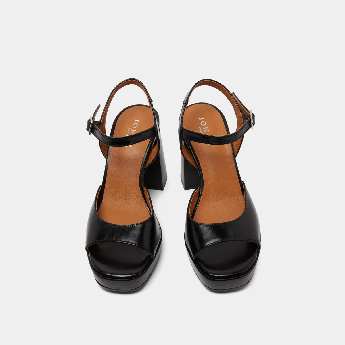 High-heeled sandals and platforms in black leather | BAMBA