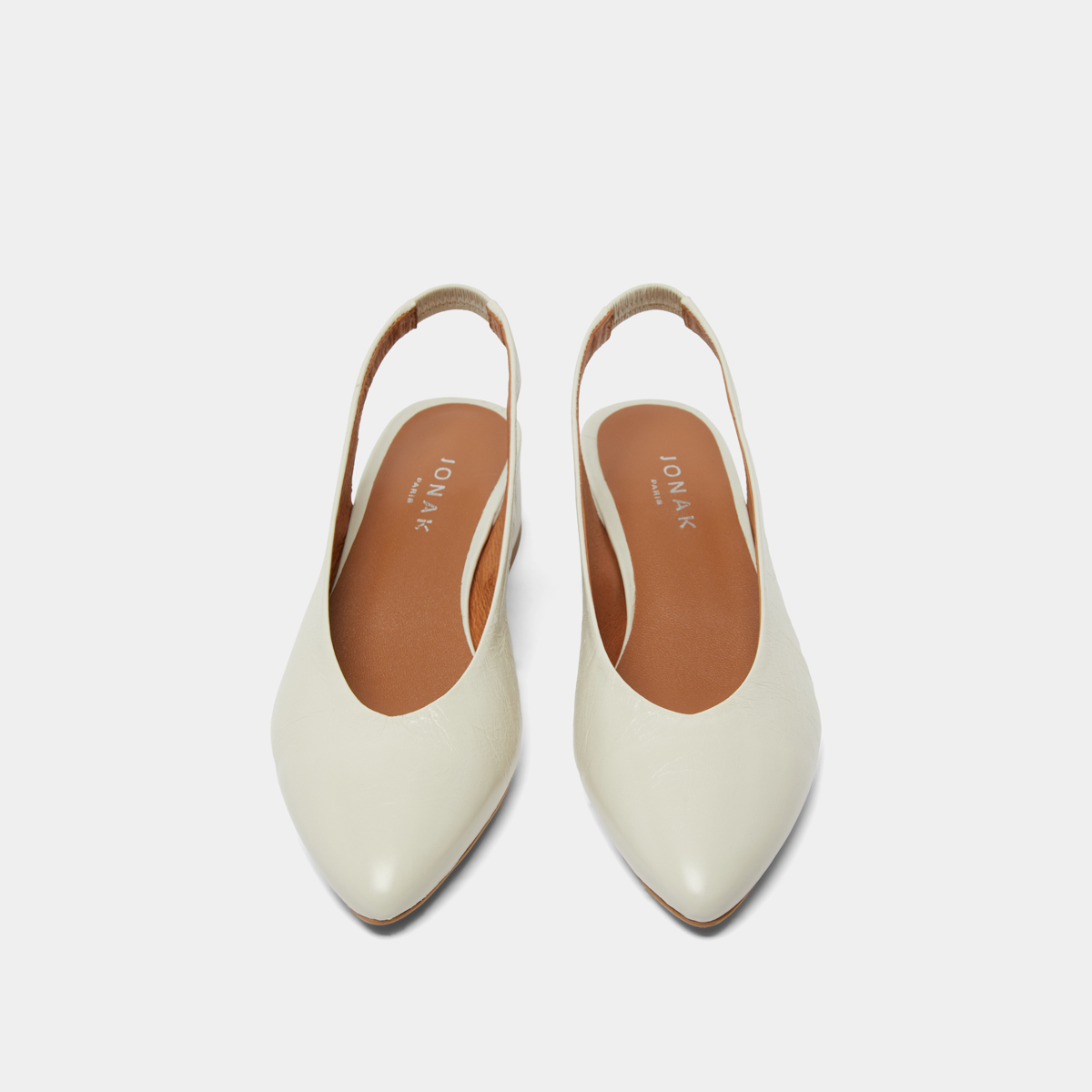 Ballet flats with open backs in ecru distressed leather | VINCE