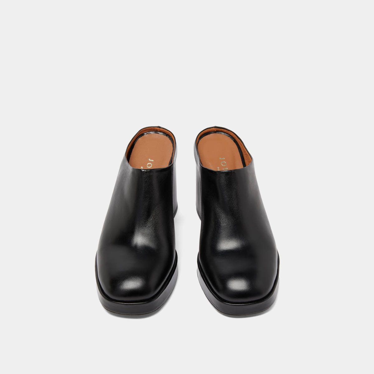 Heeled mules in black leather | VOLCAN