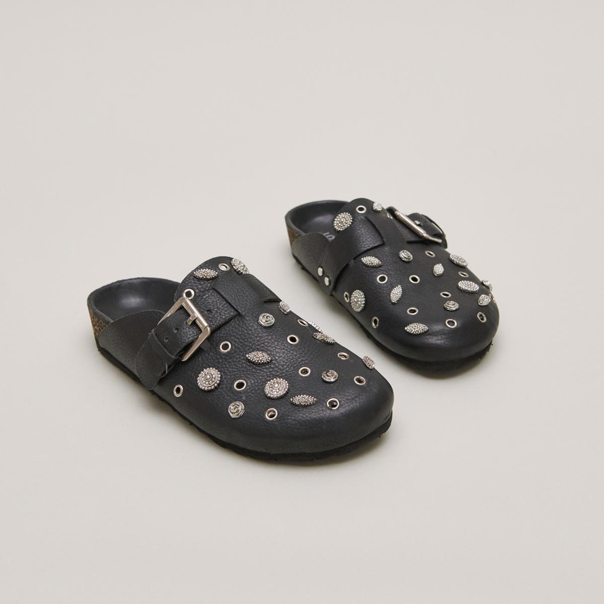 Mules with silver details in black grained leather | WASILA