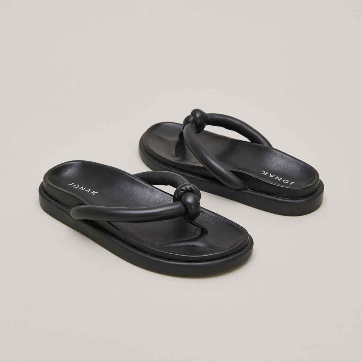 Mules with straps in black leather | WOODLAND