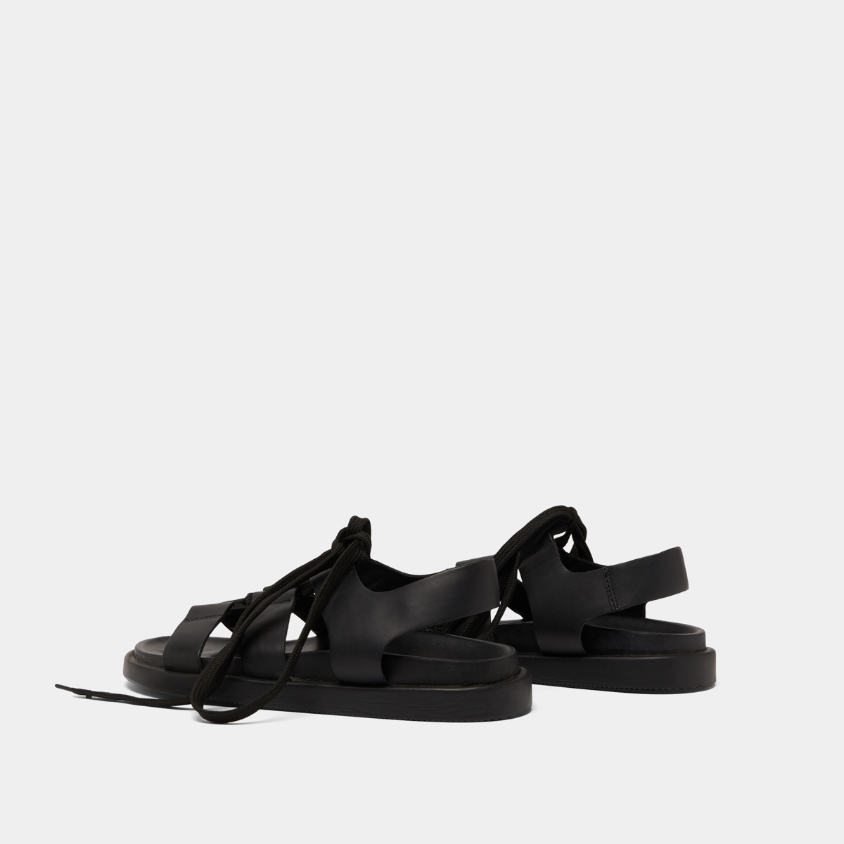 Sandals with multiple straps and laces in black leather | WELLINGTON