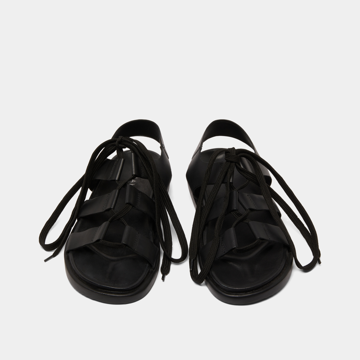 Sandals with multiple straps and laces in black leather | WELLINGTON