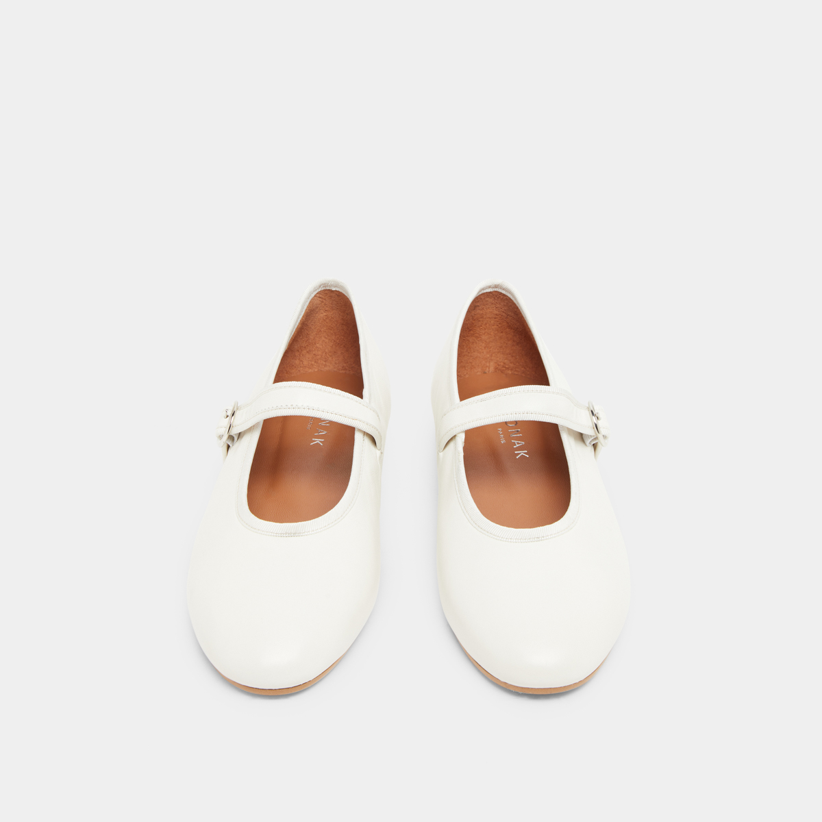 Ballet flats with straps and adjustable buckles in ecru leather | DEESSE