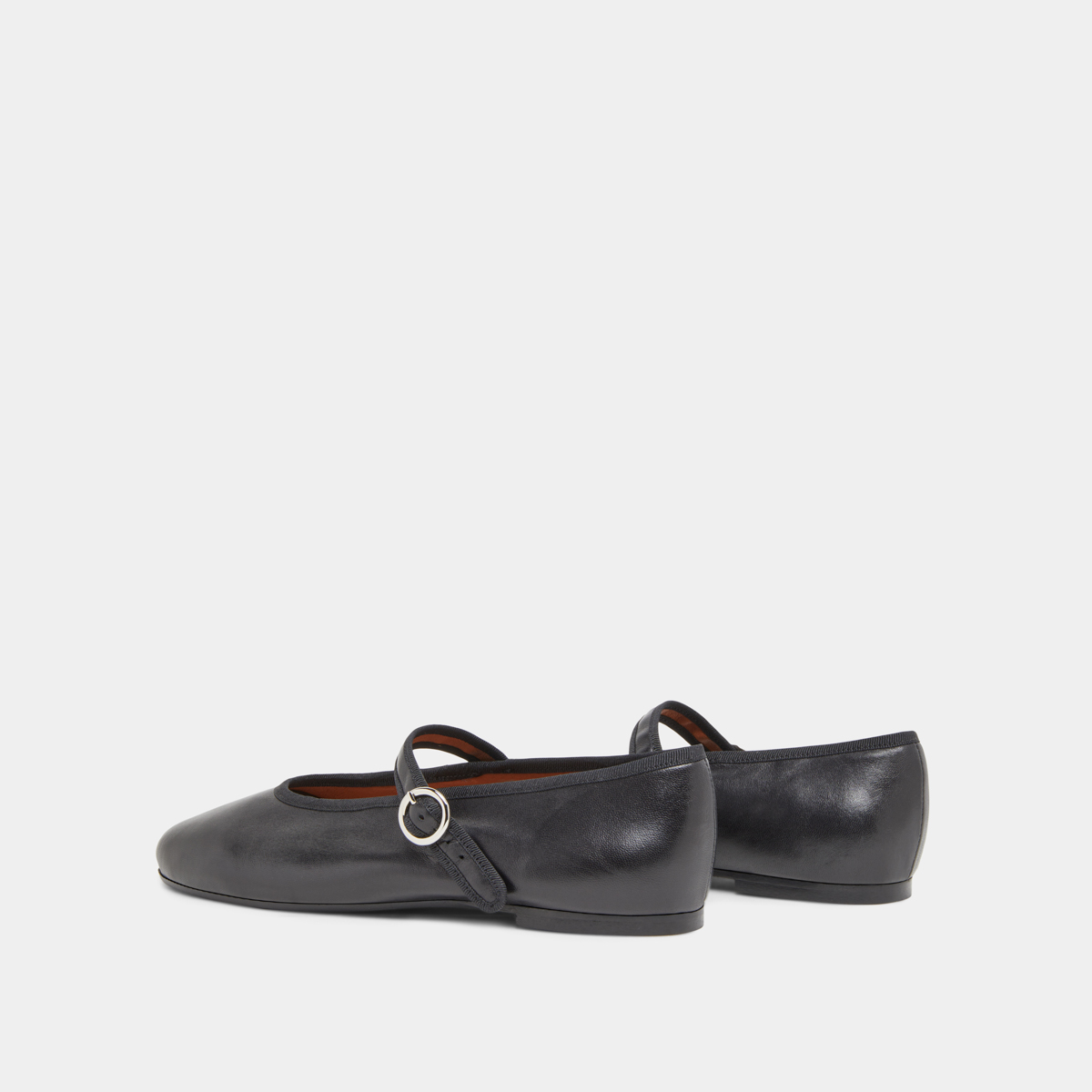 Ballet flats with straps and adjustable buckles in black leather | DEESSE