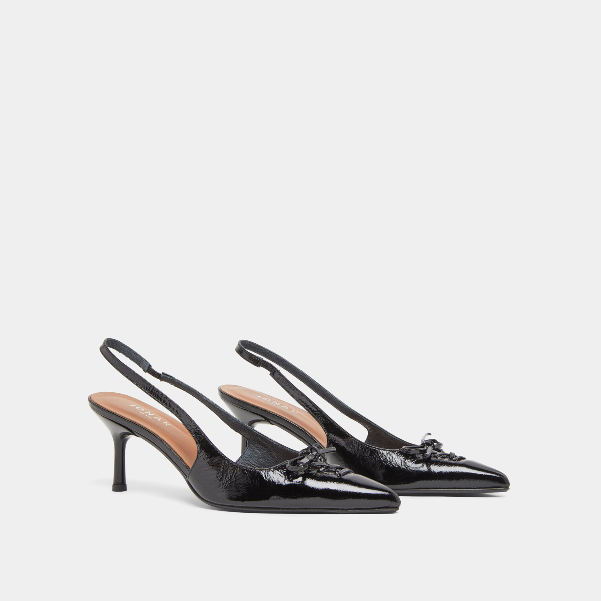 Pumps with open backs in shiny black leather | DOLENE