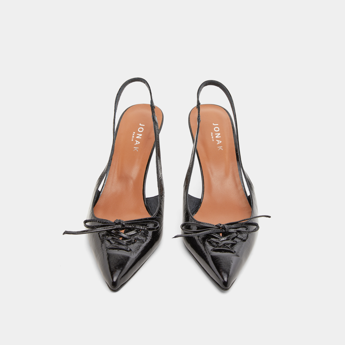 Pumps with open backs in shiny black leather | DOLENE