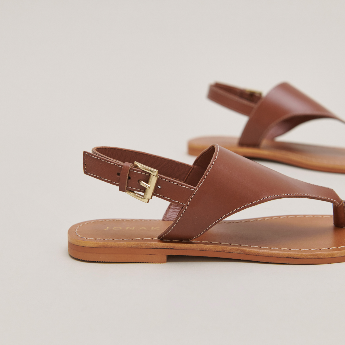 Plagettes with rear straps in cognac leather | WADE