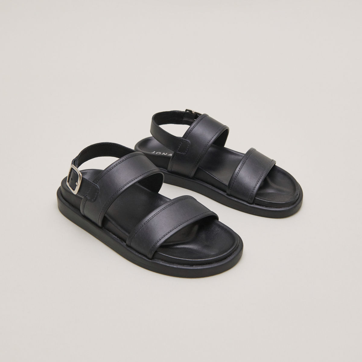 Sandals with double straps in black leather | WICHITA