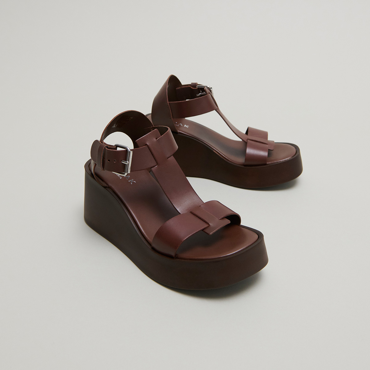 Wedge sandals with adjustable buckles in dark brown leather | ESTELLE