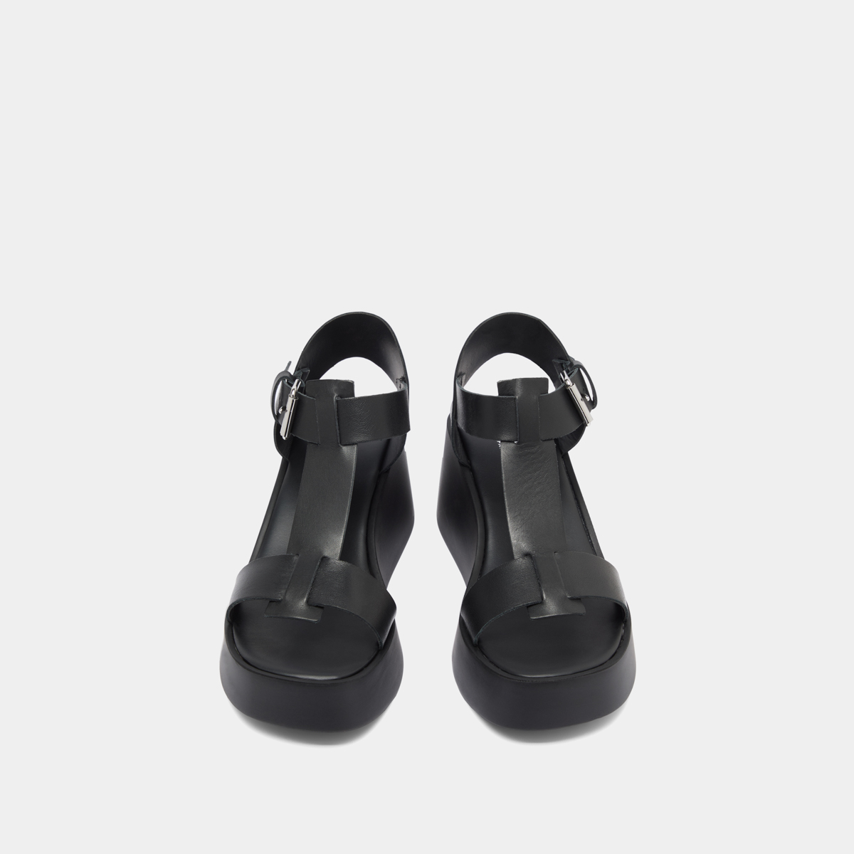 Wedge sandals with adjustable buckles in black leather | ESTELLE