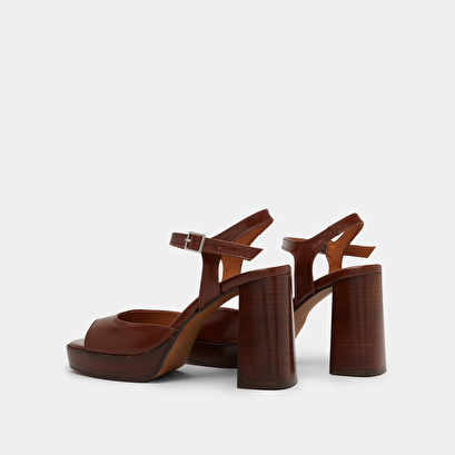 High-heeled sandals and platforms in brown leather | BAMBA