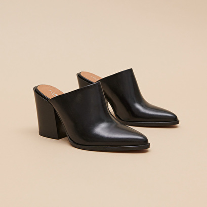 Mules with high heels in black leather | BLISS