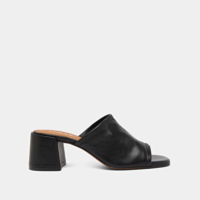 Mules with heels and open toes in black leather | butterfly