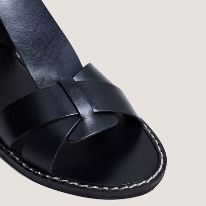 Buckle and strap sandals in black leather | whisper
