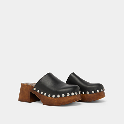 Platform mules in black leather | ELLIOT