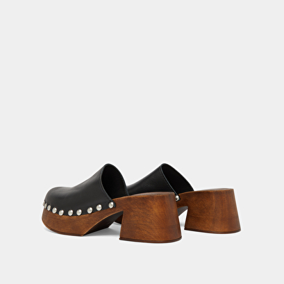 Platform mules in black leather | ELLIOT
