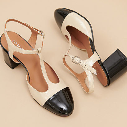 Heeled T-bar in black and ecru patent | DHAPS