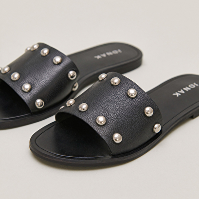 Mules with silver details in black grained leather | winslow