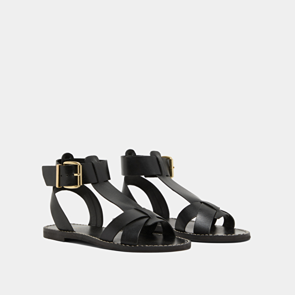 Buckle and strap sandals in black leather | WHISPER