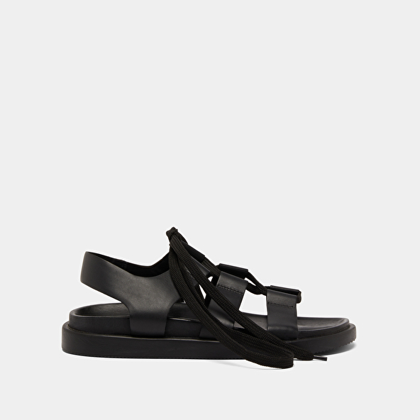 Sandals with multiple straps and laces in black leather | WELLINGTON