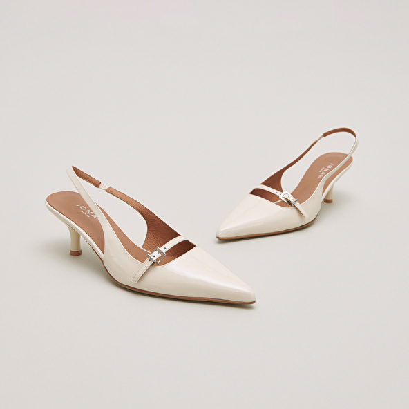Heeled pumps in ecru patent | DAMOISELLE