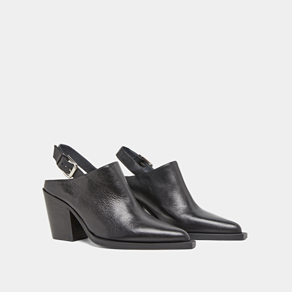 Mules with beveled heels in black leather | DOREN