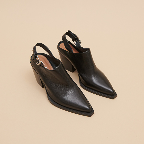 Mules with beveled heels in black leather | DOREN