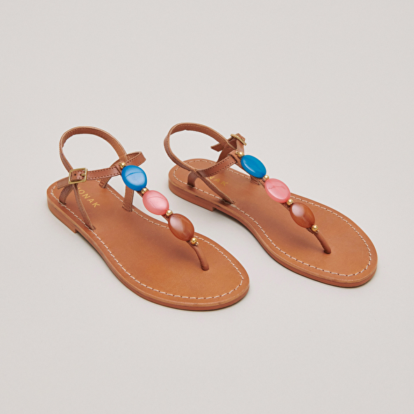 Plagettes with details in camel leather | WALID