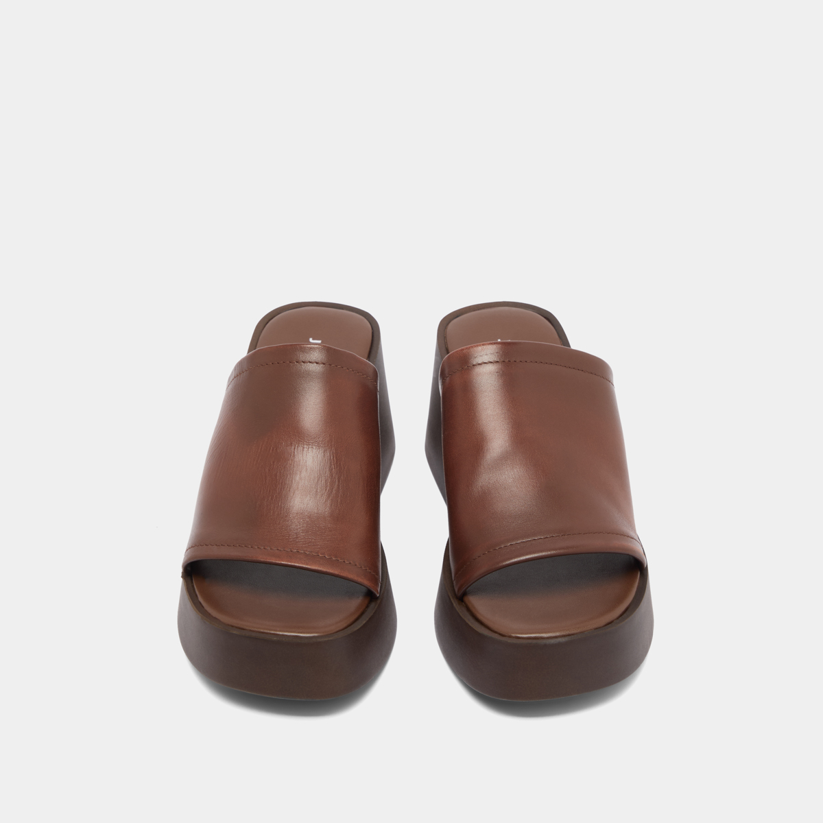 Wedge mules in dark brown leather | EUGENE