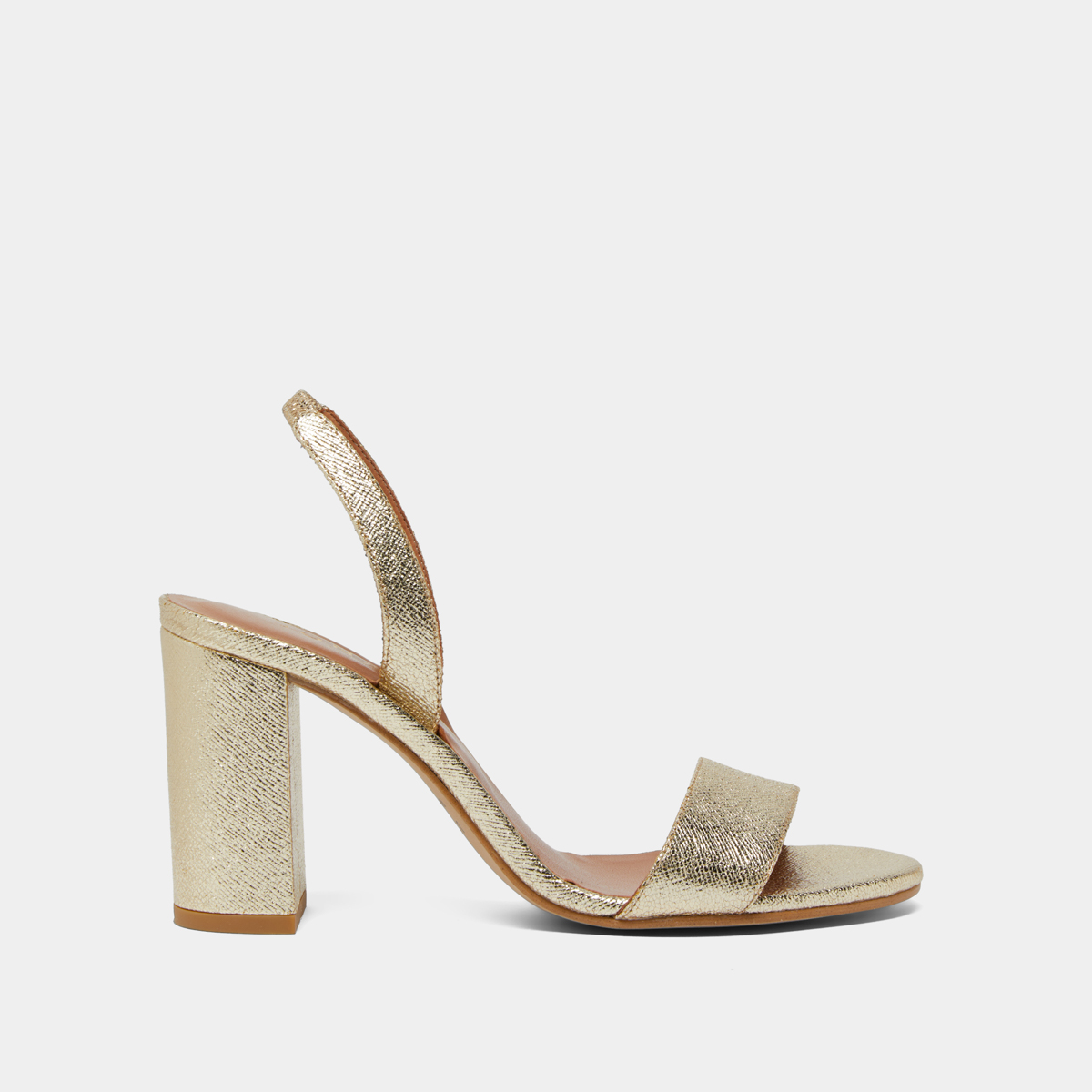 Heeled sandals in platinum metallic textile | DIDUS