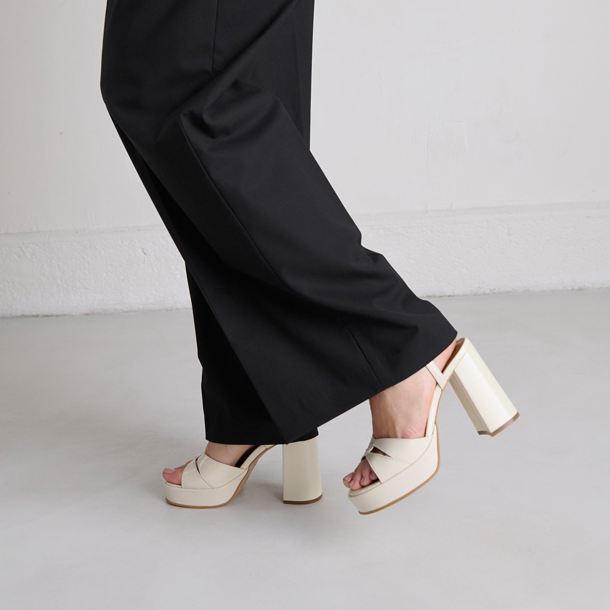 Platform sandals and high heels in ecru shiny leather | JUSTINE