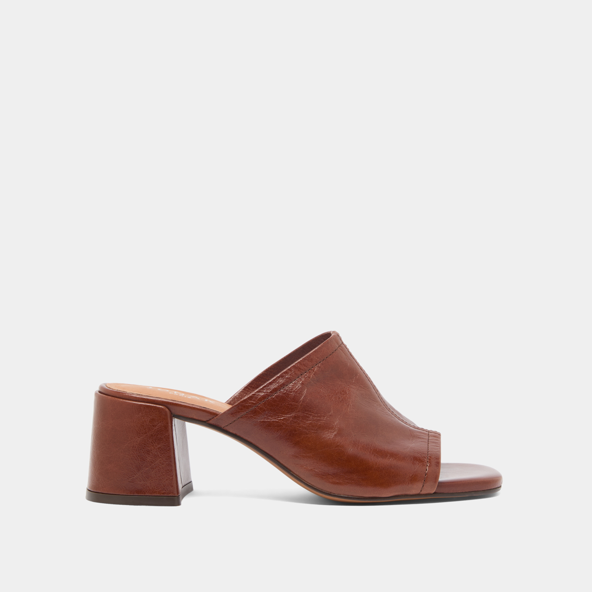 Mules with heels and open toes in brown distressed leather | BUTTERFLY