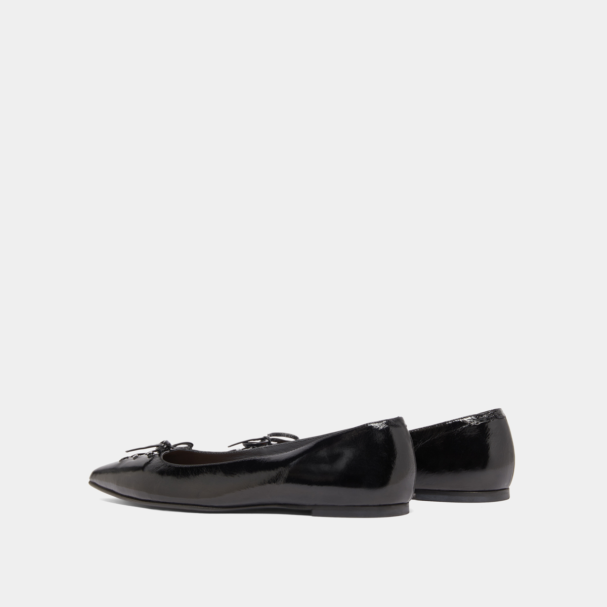 Ballerines lacées à bouts pointus in black shiny leather | DAMY
