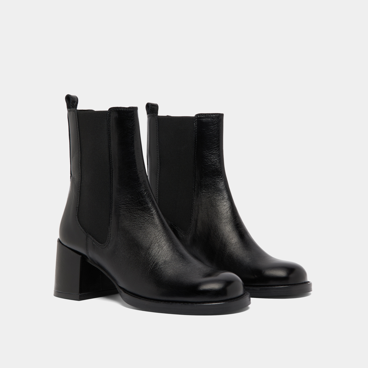 Boots à talons et élastiques in black distressed leather | BIENVUE