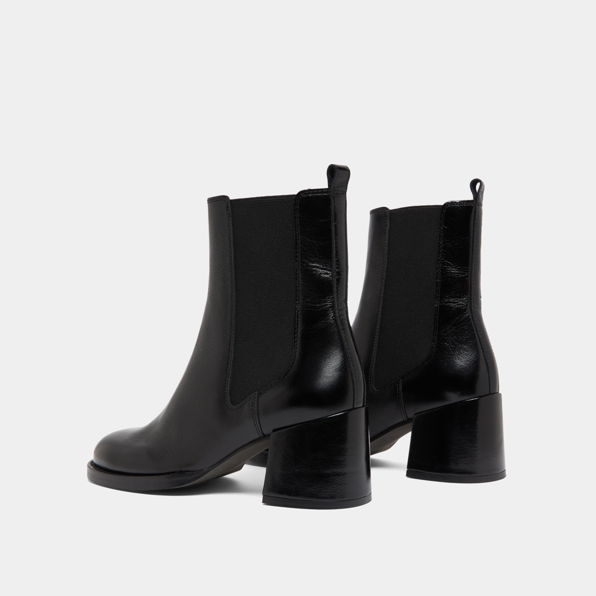 Boots à talons et élastiques in black distressed leather | BIENVUE