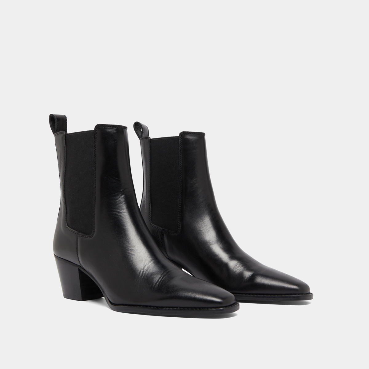 Bottines à talons biseautés et bouts poi... in black leather | BIRKIN