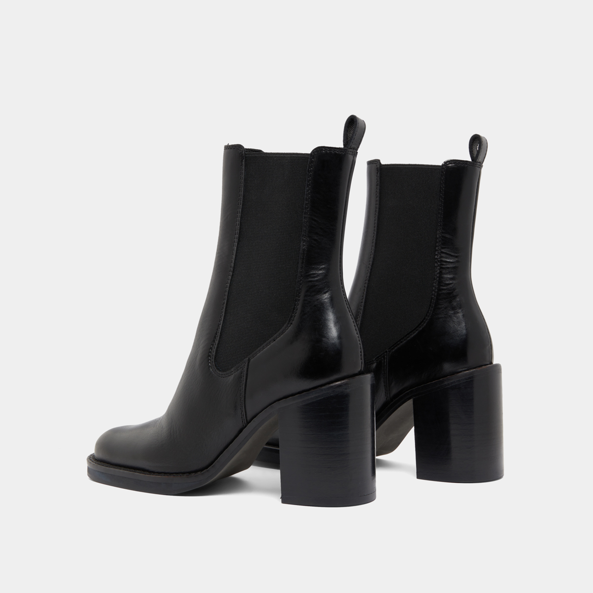 Ankle boots with overflowing heels in black leather | BRETZ