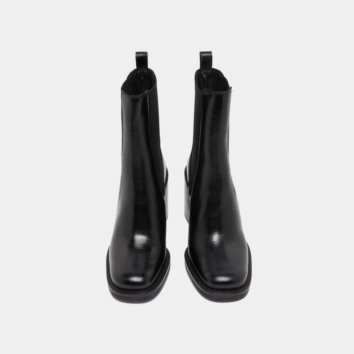Ankle boots with overflowing heels in black leather | BRETZ