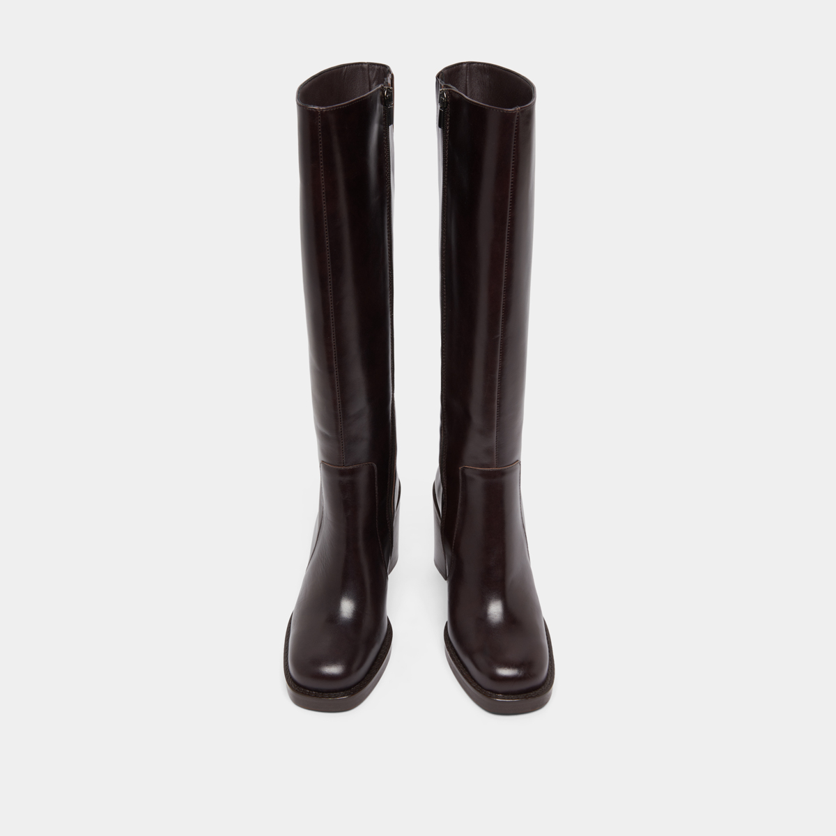 Boots with overflowing heels in dark brown leather | BRETZEL
