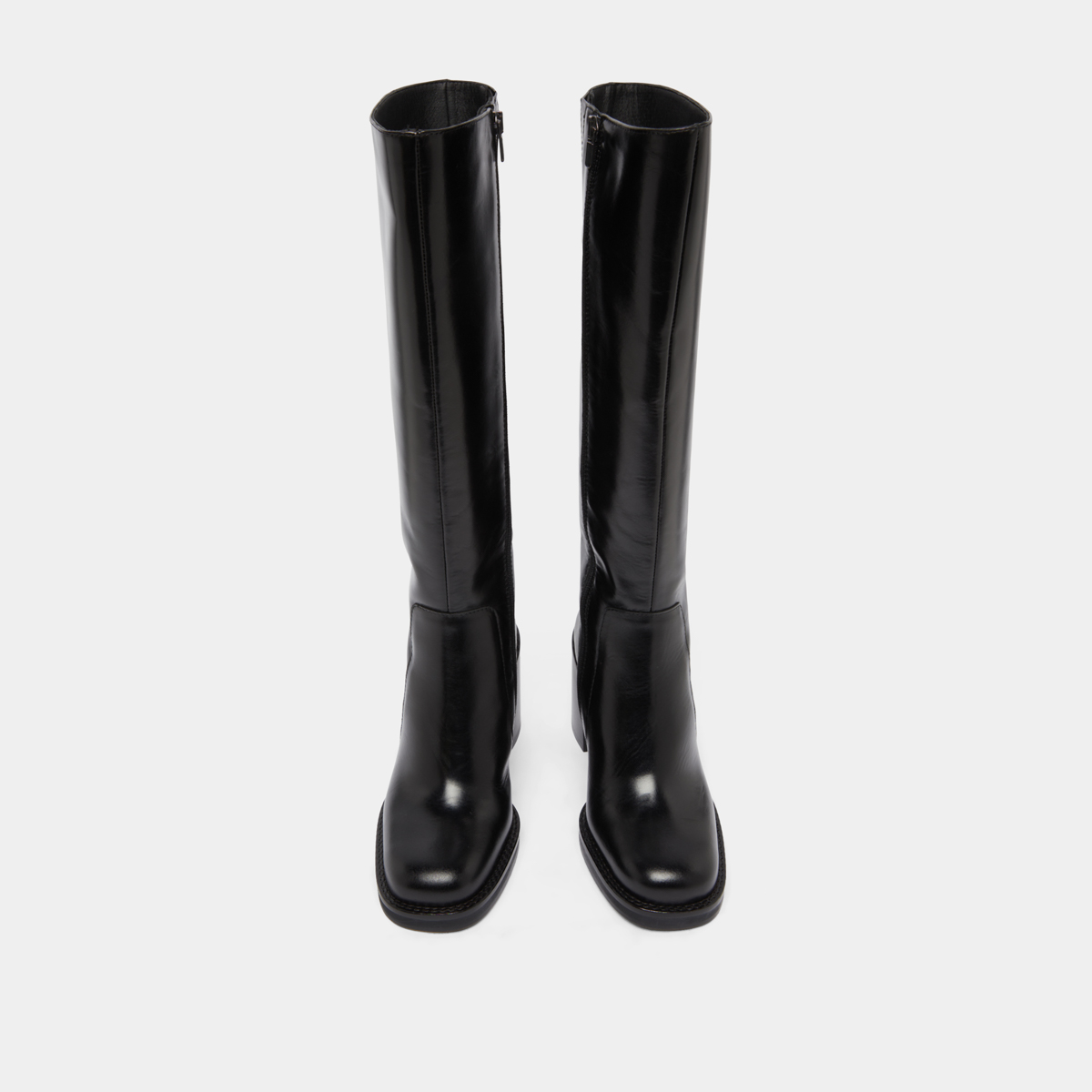 Boots with overflowing heels in black leather | BRETZEL