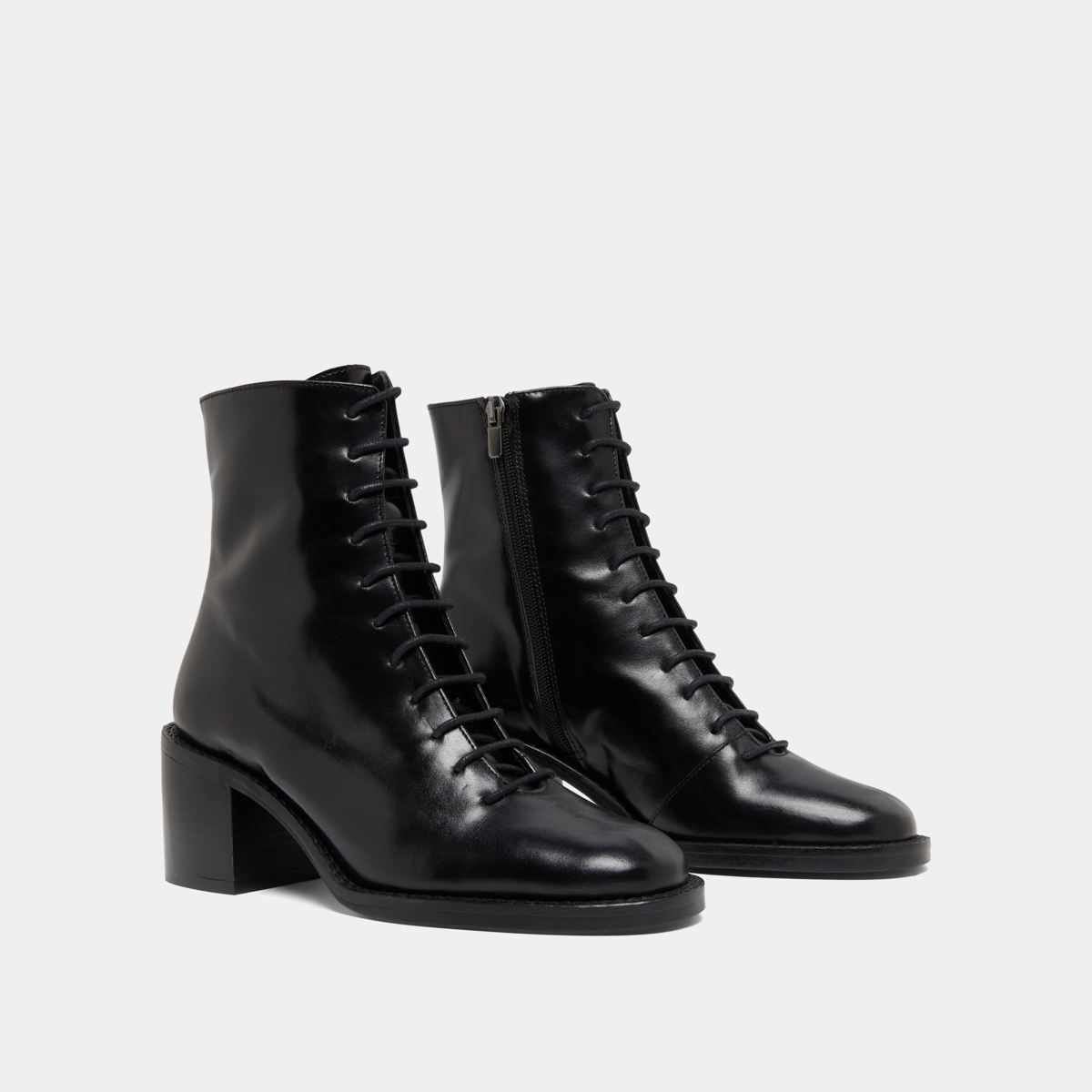 Boots à lacets et talons débordants in black leather | BRINDILLE